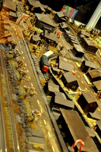 A miniature electric train with the village made entirely of chocolate!